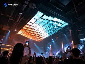 Spectrum Display SPKI-160 kinetic LED screen installed on the ceiling of a Singapore bar - visitors holding up phones to photograph the moving ceiling