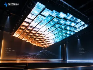 Spectrum Display SPKI-160 kinetic LED screen installed on a Singapore bar ceiling — the 1440 x 3840mm matrix of moving LED panels glowing blue and amber above the stage